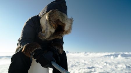 Jaxon Hoffman ice fishing with his family. (BBC Studios Reality Productions, LLC/Brian Bitterfeld)