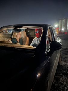 Mariana van Zeller talks to Chris in a car. (National Geographic for Disney)