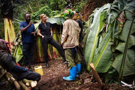 Mariana van Zeller speaks with the pygmy poachers deep in the forest in the Democratic Republic of the Congo. (National Geographic for Disney)