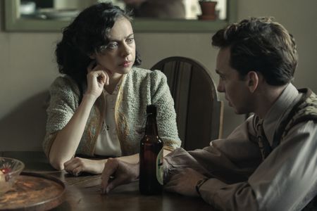 A SMALL LIGHT - Miep Gies, played by Bel Powley, talks with her brother Cas, played by Laurie Kynaston, in A SMALL LIGHT.  (Credit: National Geographic for Disney/Dusan Martincek)