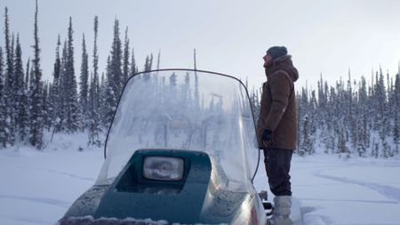 Johnny Rolfe checks his marten traps before the season is over. (BBC Studios/Charlie Beck)