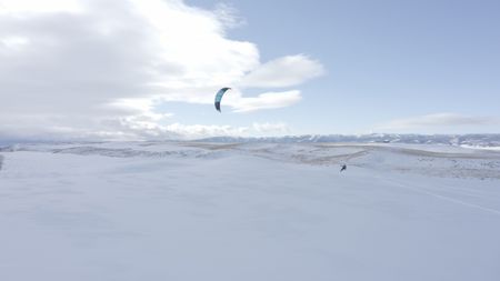 Sarah-McNair Landry Kite Skiing.   (photo credit: National Geographic /Ross McDonnell)