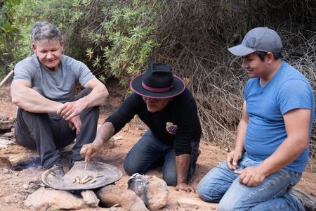 Oaxaca, Mexico - Omar Alonzo (center) and Pepe Karizoza (R) show Gordon Ramsay (L) how to cook grub worms. (Credit: National Geographic/Justin Mandel)