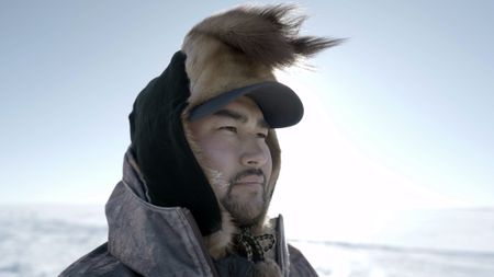 Avery Hoffman ice fishing with his family in freezing temperatures.(BBC Studios Reality Productions, LLC/Brian Bitterfeld)