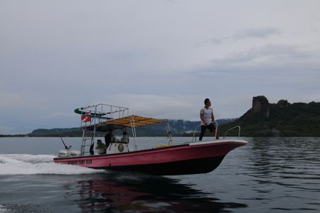 Dr. Albert Lin sails away from Pohnpei Island, Micronesia, towards Ant Atoll. (National Geographic/Blakeway Productions)