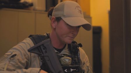 CBP AMO Agent Brittany grabs her rifle and preps her gear for the evening.  (Lucky 8 TV/Valery Lyman)