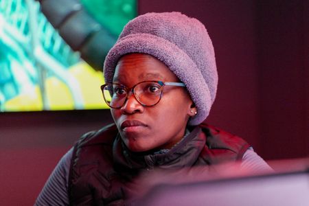Zoleka Filander sits in Mission Control. (National Geographic/Mario Tadinac)