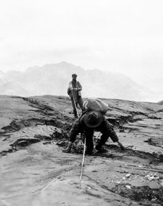 Two members of the National Geographic Expedition to The Valley of Ten Thousand Smokes climbing the slopes of Mount Katmai. (credit: National Geographic Society)