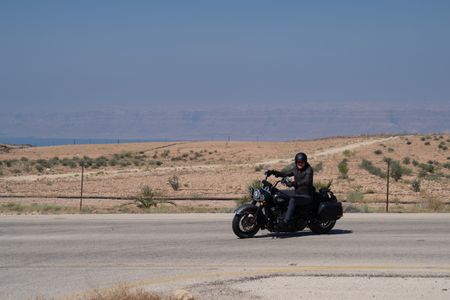 Gordon Ramsay rides a motorcycle through the desert. (National Geographic/Justin Mandel)