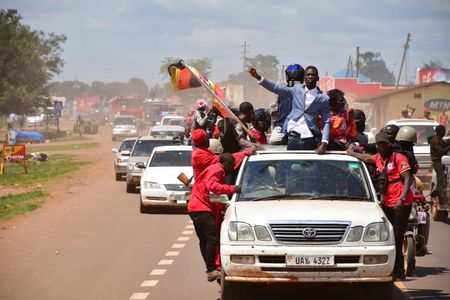Bobi Wine atop his vehicle as he drove through Kayunga district during the presidential campaigns that were flawed with brutality and violence by security agencies, December 1, 2020.  (photo credit: Lookman Kampala)