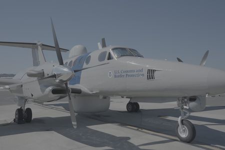 A CBP air vehicle is parked on a tarmac in San Diego, Calif. (National Geographic)