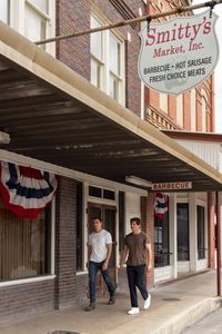 Antoni Porowski and James Marsden arrive in Lockhart, TX to try Texas barbecue. (National Geographic/Amy Mikler)