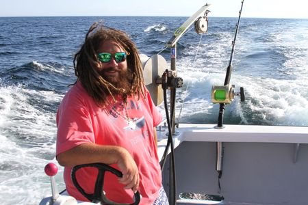 Gloucester, MA - Captain TJ Ott is all smiles knowing this trip he has his lucky charm, his nephew, aboard the Hot Tuna. (PFTV/Kyle Haggerty)