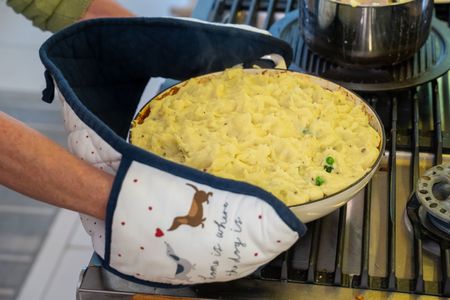 The Shepherd's Pie is put into the oven. (National Geographic/Chris Raphael)