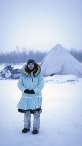 Qutan Hailstone ice fishing with her family. (BBC Studios Reality Productions, LLC/Pedro Delbrey)