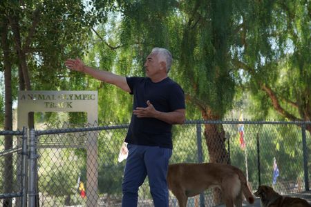 Cesar Millan talking to a client at the DPC. (National Geographic)