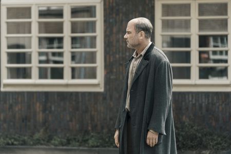 A SMALL LIGHT - Otto Frank, played by Liev Schreiber, returns to Amsterdam as seen in A SMALL LIGHT. (Credit: National Geographic for Disney/Dusan Martincek)