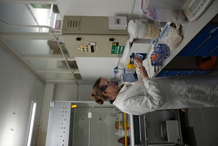 University College London geoarchaeologist Anke Marsh examines a fresh sample in the lab. (Windfall Films/Josh Rowley)