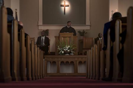 Martin Luther King Jr., played by Kelvin Harrison Jr., preaches from behind the pulpit in GENIUS: MLK/X. (National Geographic/Richard DuCree)