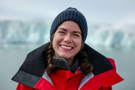 Melissa Marquez smiles aboard the OceanXplorer.  (National Geographic/Mario Tadinac)