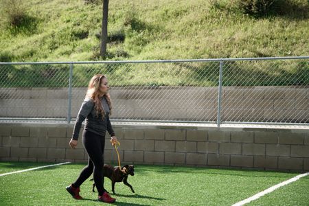 Jen in a walking exercise with Boss. (National Geographic)