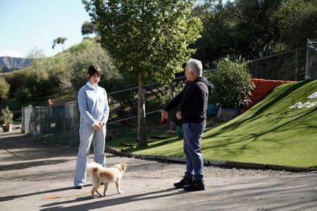 Cesar talks to Isabella with dog Matisse at the Dog Psychology Center. (National Geographic)