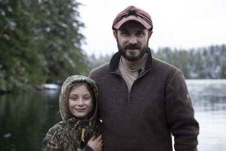 Cole Sturgis with his daughter, Timber on their float house. (BBC Studios Reality Productions, LLC/Danny Day)