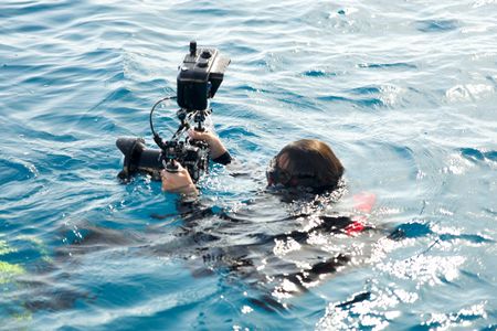 Drama recreation underwater of director of photography Samuel Gonzalez filming the Trent Trentcosta. (National Geographic/Simon Dales)