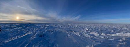 The open frozen landscape of the shore of Hudson Bay, Canada, where the crew are searching for polar bears and wolves. (National Geographic for Disney/Duncan Chard)
