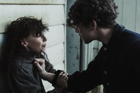 Hornaeus shoves a young boy against a wall as he interrogates him. (Dash Productions Services LTD/Antoan Ivanov)