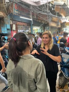 Mariana van Zeller meets journalist Cheena Kapoor in Chandni Chowk, one of the biggest medicine markets in India. (National Geographic for Disney)