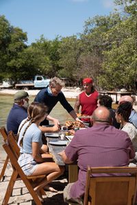 Gordon Ramsay and Chef Paul present their final dishes to their guests. (National Geographic/Justin Mandel)