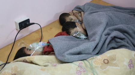 Al Ghouta, Syria - Children recovering with oxygen after a chemical attack. (National Geographic)