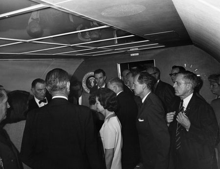 Attendees gather during Lyndon B. Johnson's swearing in ceremony as President of the United States aboard Air Force One, Nov. 22, 1963, in Dallas. (Cecil Stoughton/White House Photographs/John F. Kennedy Presidential Library and Museum, Boston)