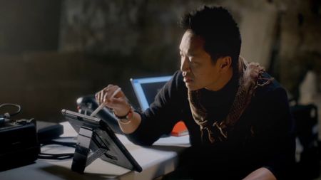 Acre, Israel - Albert Lin analyzing data in lab. (National Geographic)