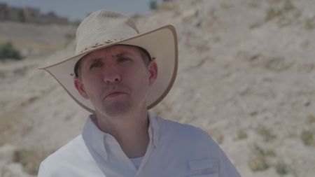 Archaeologist Pearce Paul Creasman poses for a portrait in Tel Dhiban. (Windfall Films/Alex Collinge)