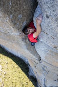Alex Honnold free soloing the Scotty-Burke offwedth pitch of Freerider on Yosemite's El Capitan. (National Geographic/Jimmy Chin)