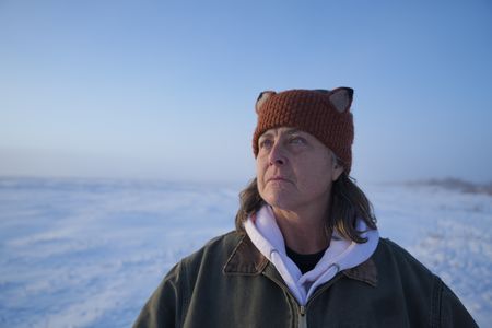 Sue Aikens hunts for ptarmigan in the tundra during the winter season for subsistence food. (BBC Studios Reality Productions, LLC/Jayce Kolinski)