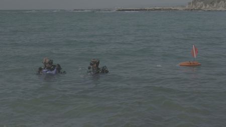 Beverly Goodman and Jeremy Gabriel are pictured during an exploratory dive off the coast of Caesarea in Caesarea, Israel. (Windfall Films)