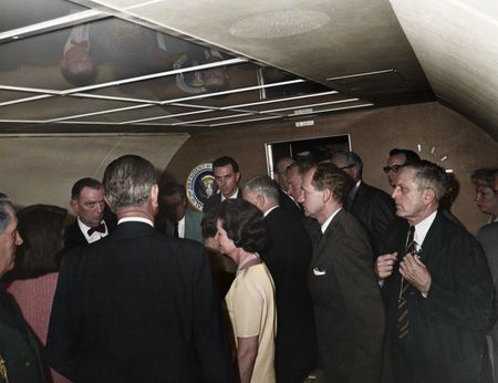 This colorized archival image shows those attending the swearing-in ceremony of Lyndon B. Johnson (LBJ) as President aboard Air Force One, Nov. 22, 1963, in Dallas. (Cecil Stoughton/White House Photographs/John F. Kennedy Presidential Library and Museum, Boston)