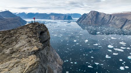 Alex Honnold and Hazel Findlay on the summit of Ingmikortilaq. (photo credit: National Geographic/Matt Pycroft)