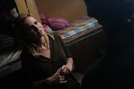 Mariana van Zeller discusses sextortion with Diego in a jail in Bulacan. (National Geographic for Disney)