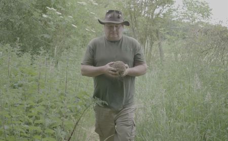 Martin holding a hedgehog. (Big Wave Productions)