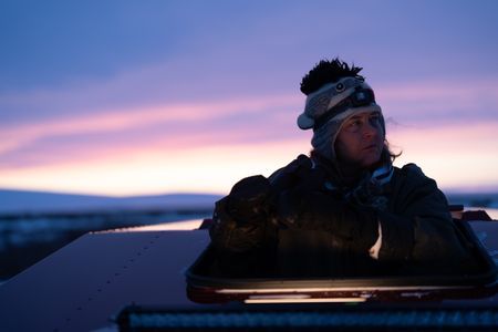 Sue Aikens is on the lookout for ptarmigan and rabbits as an opportunity to gather subsistence food during the winter season. (BBC Studios Reality Productions, LLC/Jayce Kolinski)