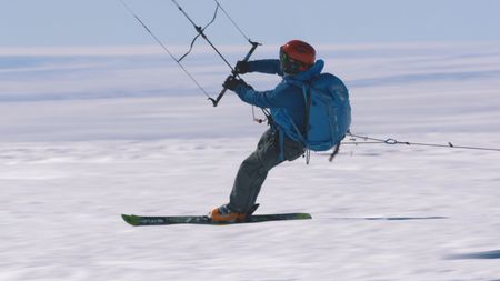 Kite skiing on an expedition in Greenland.  (photo credit: Red Bull Media House)