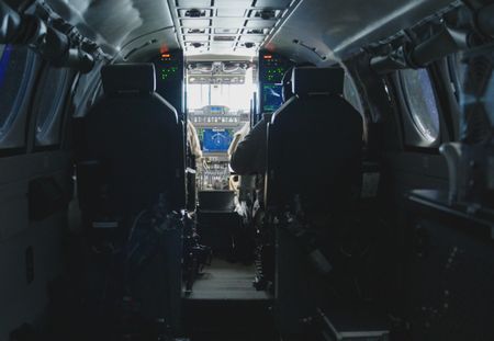 Two CBP Agents fly an aircraft from inside the cockpit in Mayaguez, PR. (Lucky 8 TV)