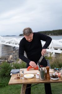 Rockland, ME - Gordon Ramsay prepares fresh lobster for grilling during the final cook. (Credit: National Geographic/Justin Mandel)