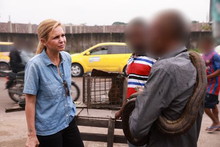 Mariana van Zeller speaks with the Boss about the animals for sale in the Kenshasa market. (National Geographic for Disney)