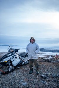 Chip Hailstone prepares  his snowmobile to travel to a nearby location to build a bird blind during the early spring migration. (BBC Studios Reality Productions/Ashton Hurlburt)