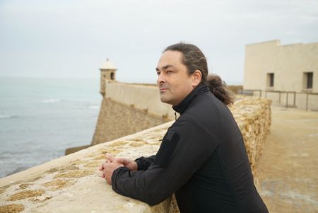 Claudio Lozano stands atop Matagorda fort in Cadiz, looking over the Bay of Cadiz. The fort was used to defend against the french navy in the penninsular war in Spain. (National Geographic/Ciaran Henry)